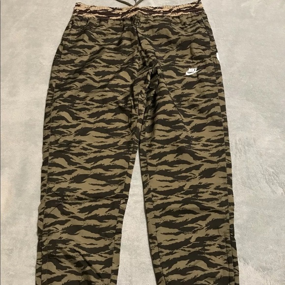nike big swoosh woven pants